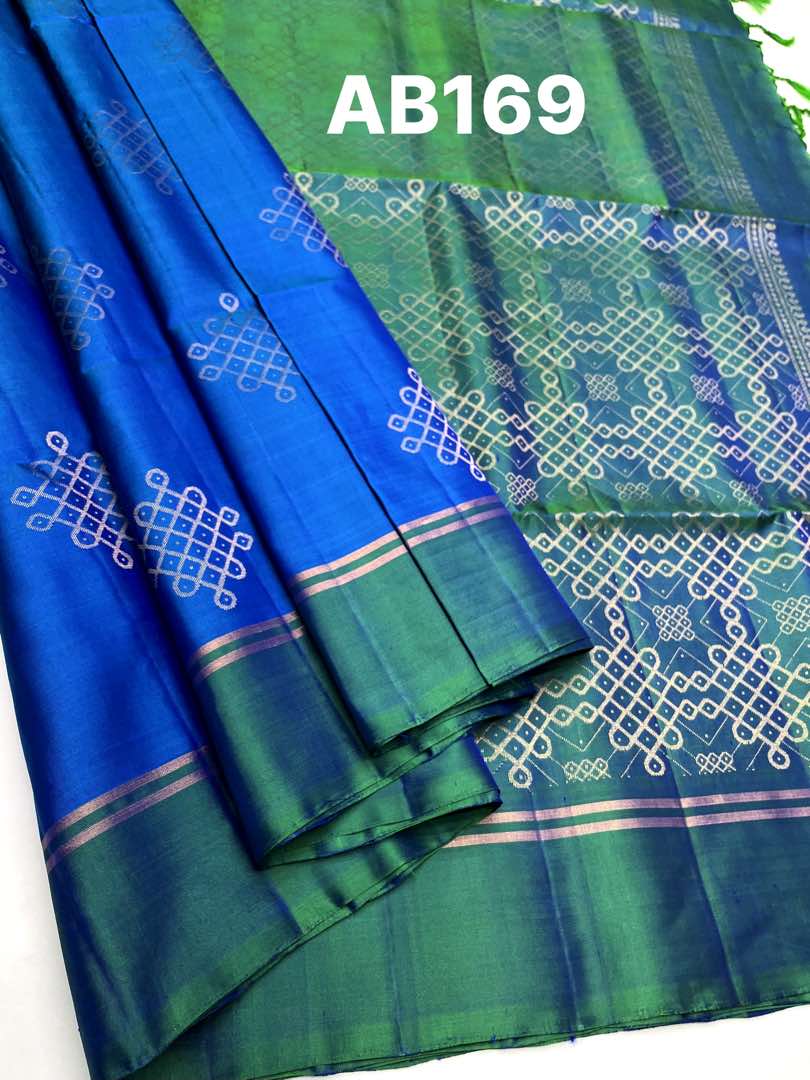 Beautifull Handloom Soft Silk Kolam saree in Peacock Blue with Peacock Green