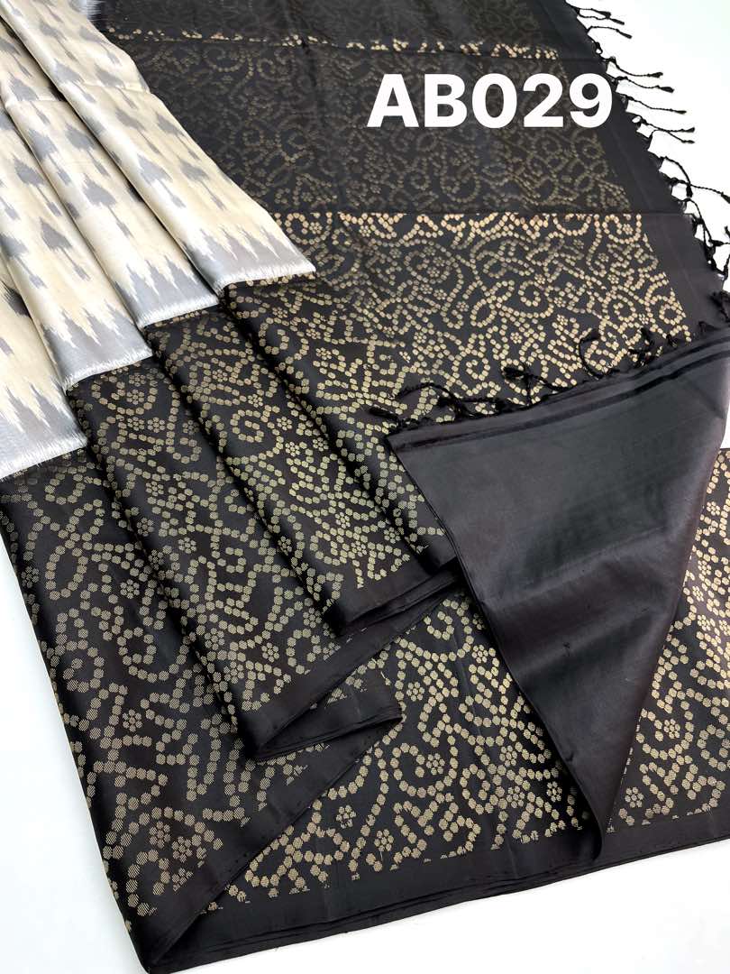 Beautiful Handloom Soft Silk Pochampally saree in Half White with Black