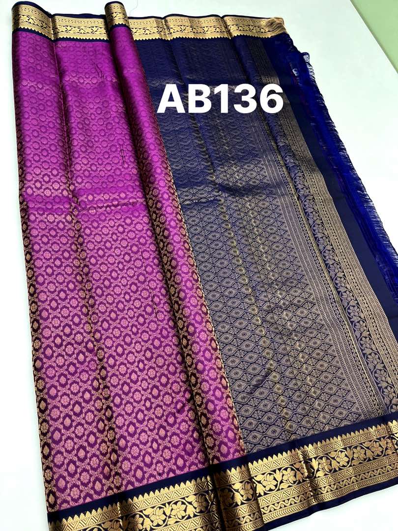 Beautifull Handloom Soft Silk Empose Design saree in Purple with Blue