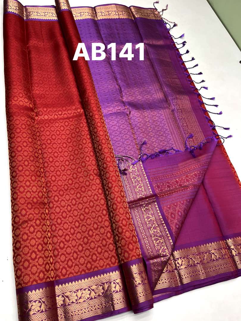 Beautifull Handloom Soft Silk Empose Design saree in Red with Lavender