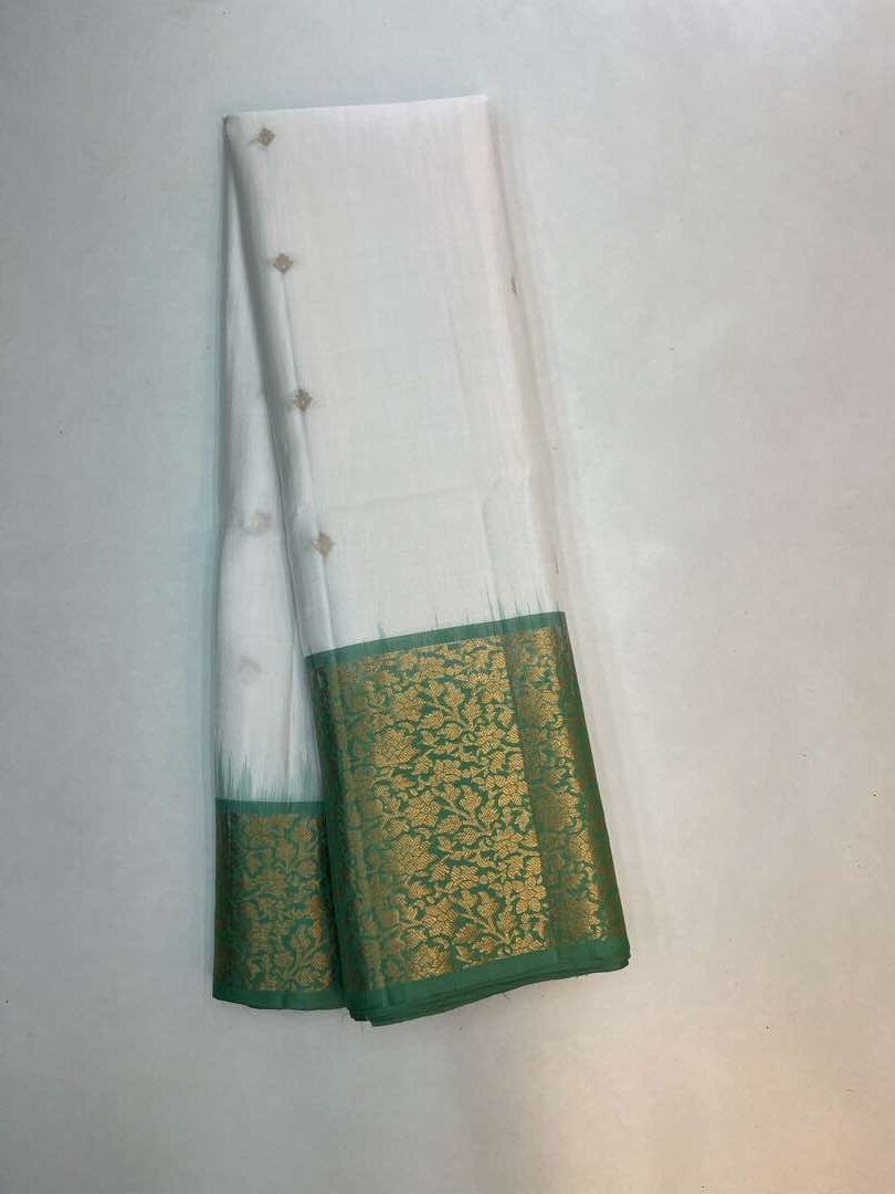 Beautiful Handloom Soft Silk Bhutta saree in White with Pastel Green