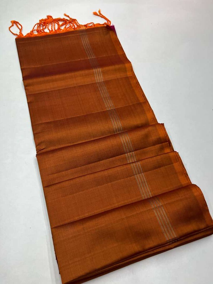 Beautiful Handloom Soft Silk Plain saree in Rust color