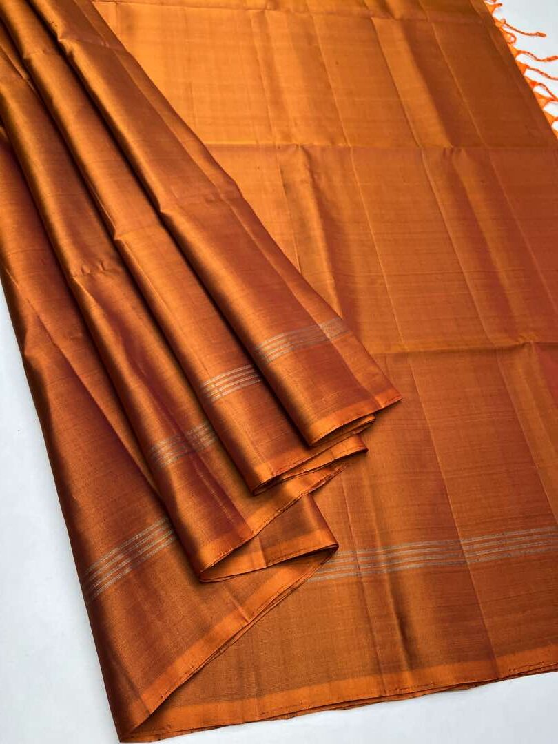 Beautiful Handloom Soft Silk Plain saree in Rust color