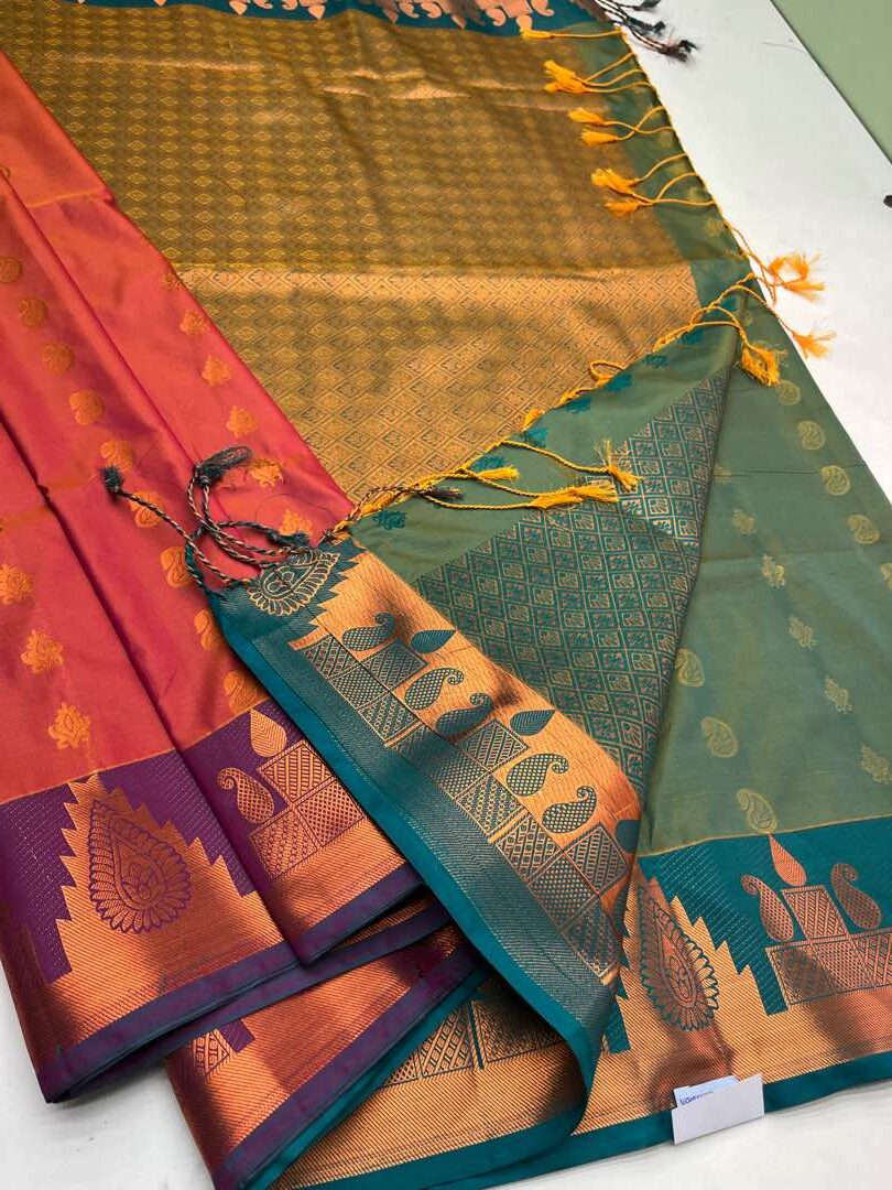 Semi  silk  Bhutta saree in Orangish pink with Yellow cross Blue