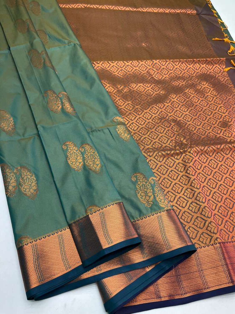 Semi  silk  Bhutta saree in Pastel Green with Yellow cross Blue