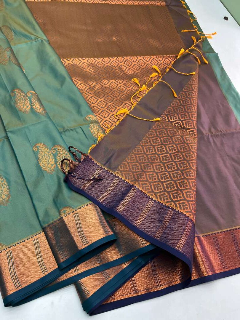 Semi  silk  Bhutta saree in Pastel Green with Yellow cross Blue