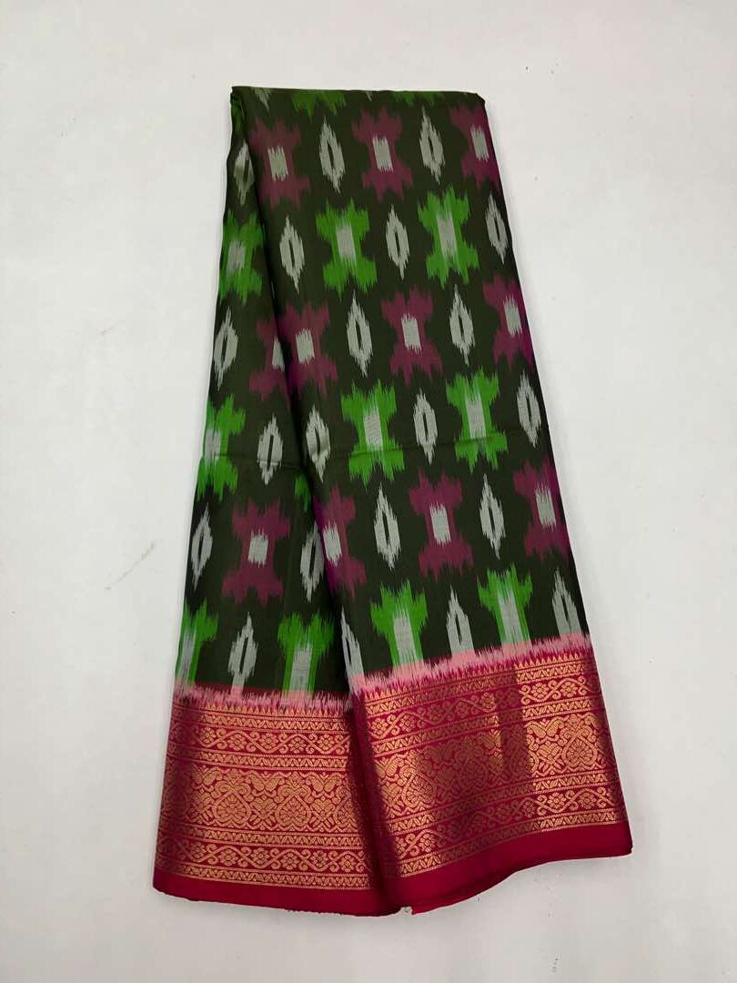 Beautiful  Handloom Soft Silk Pochampally saree in Green with Orangish Pink