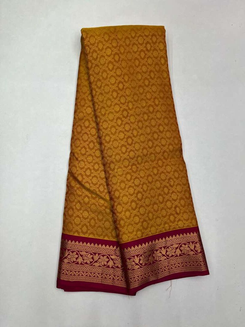 Beautiful Handloom Soft Silk Empose Design saree in Yellow with Pink