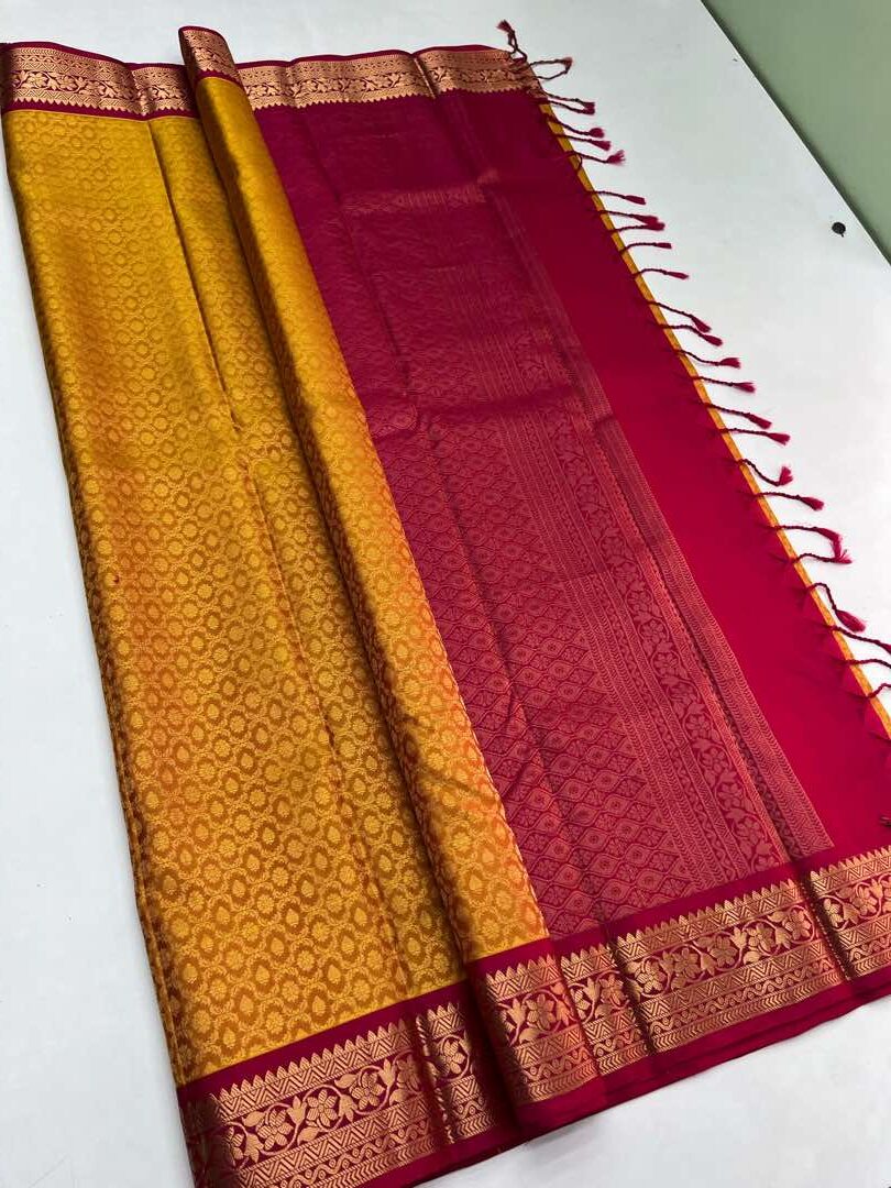 Beautiful Handloom Soft Silk Empose Design saree in Yellow with Pink