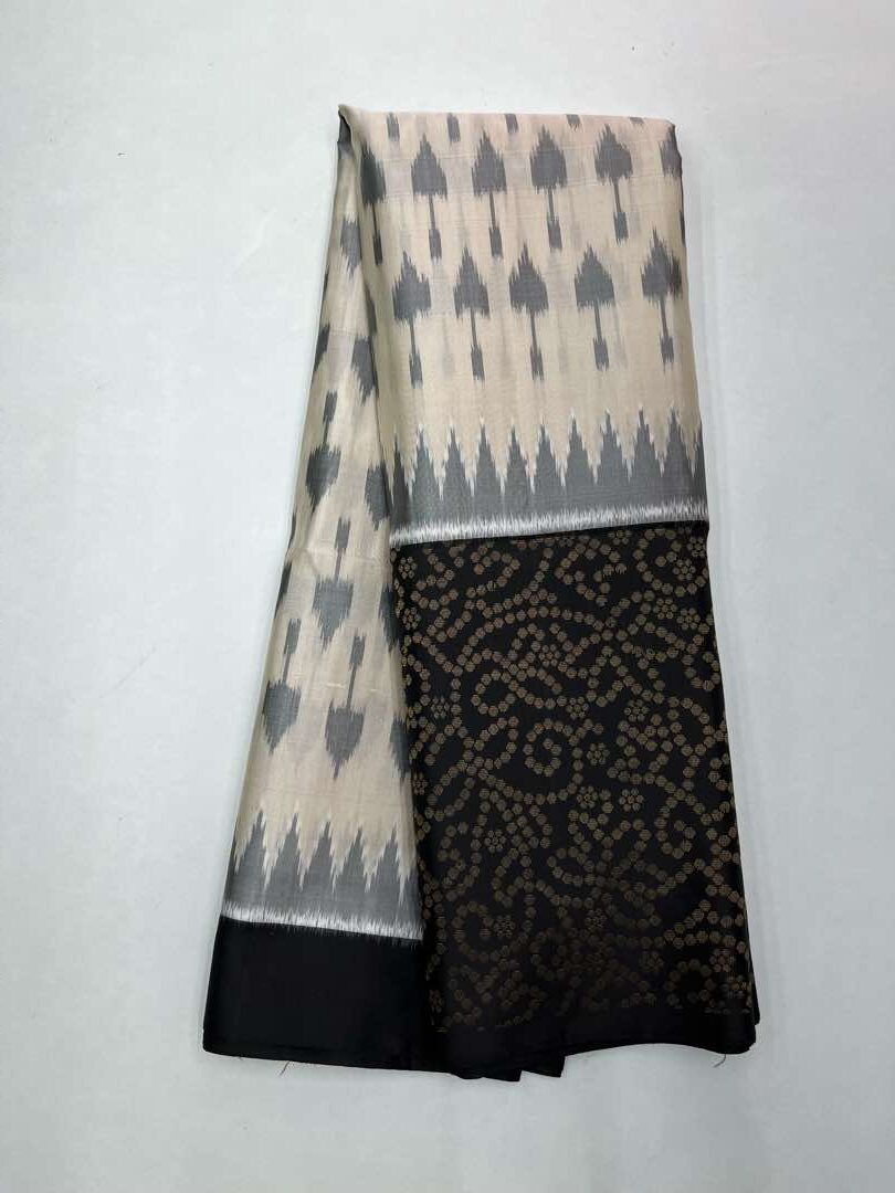 Beautiful Handloom Soft Silk Pochampally saree in Half White with Black