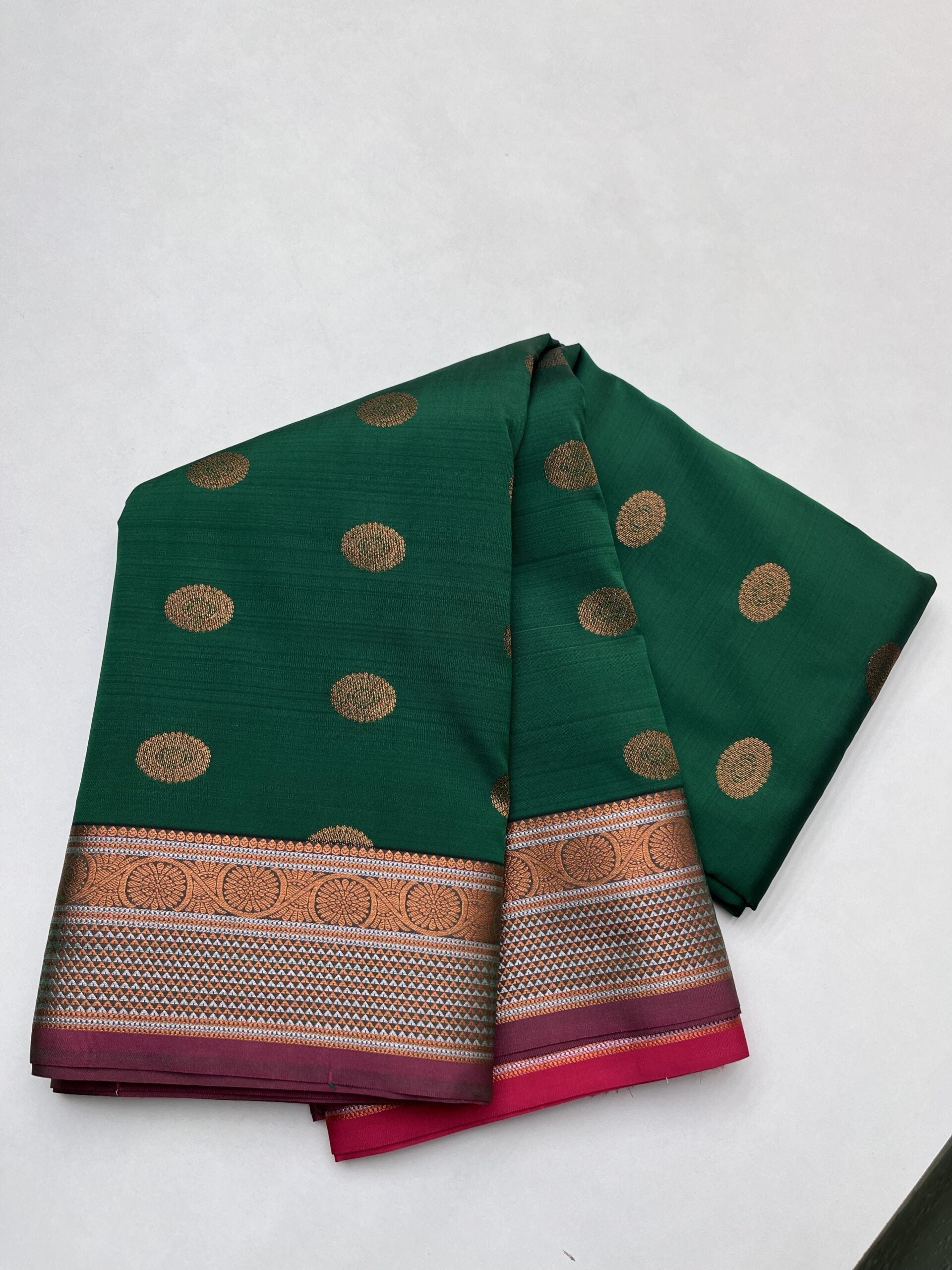 Kanjeevaram Semi silk saree with Jaquard Border in Bottle green with Pink