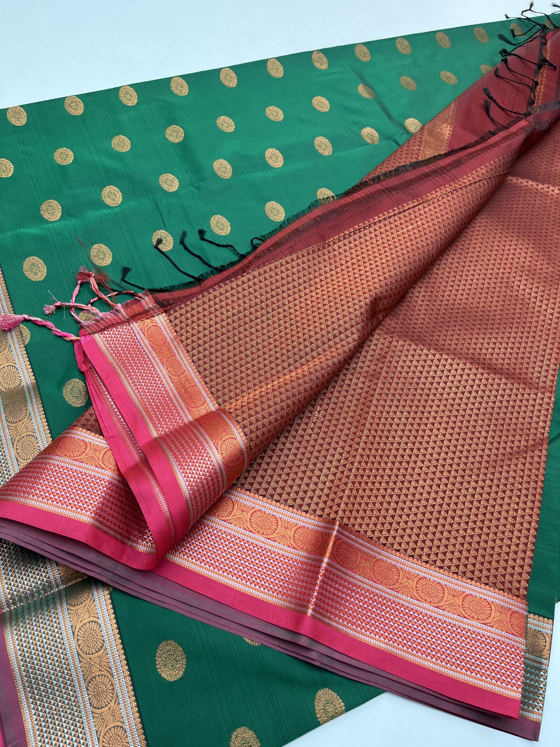 Kanjeevaram Semi silk saree with Jaquard Border in Bottle green with Pink